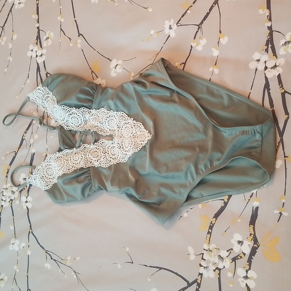 Flattering One Piece - Picture 1 of 6